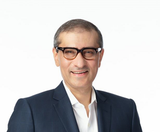 Rajeev Suri Digicel announcement shot.JPG